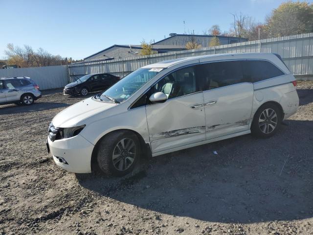 Photo 1 from auction – 2014 HONDA ODYSSEY TO with VIN 5FNRL5H99EB077781