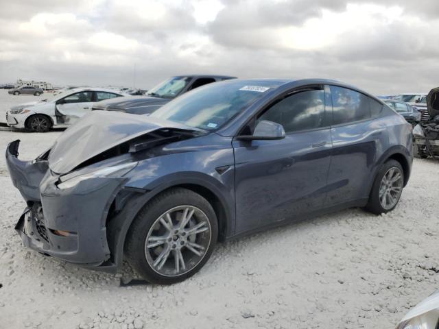 TESLA MODEL Y 2023 with VIN 7SAYGDEE3PA165028 - Photo from auction