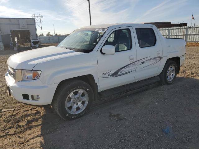 HONDA RIDGELINE 2010 with VIN 5FPYK1F47AB010922 - Photo from auction