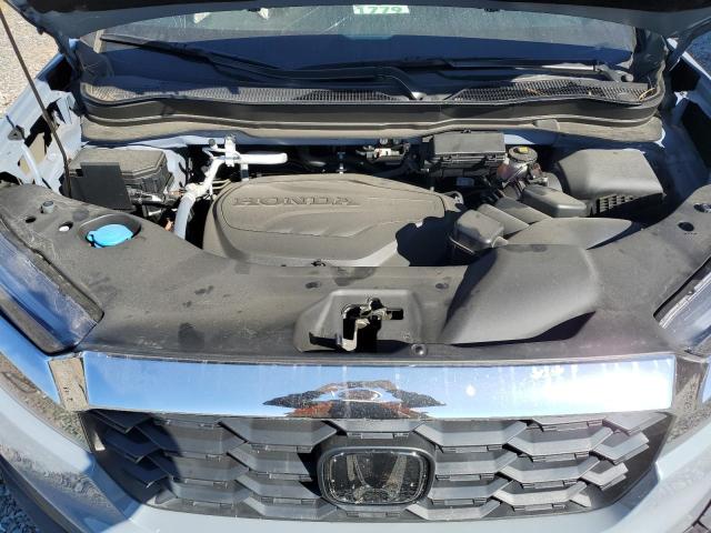 Photo 12 from auction – 2023 HONDA PASSPORT E with VIN 5FNYF8H51PB022486