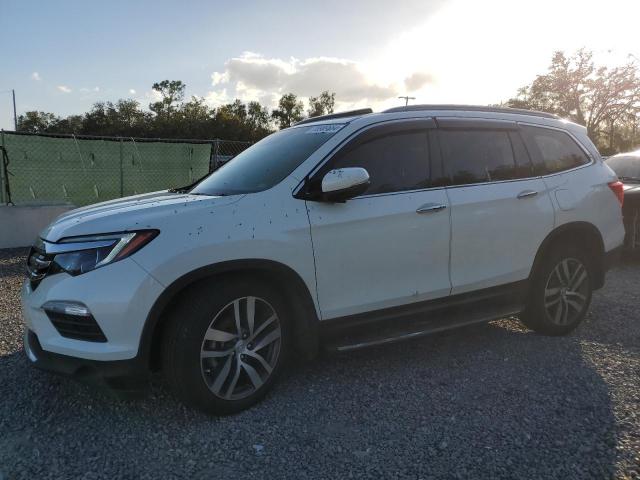 HONDA PILOT ELIT 2017 with VIN 5FNYF6H07HB056930 - Photo from auction