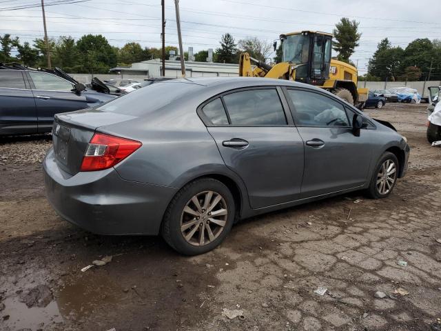 Photo 3 from auction – 2012 HONDA CIVIC EXL with VIN 2HGFB2F97CH310119