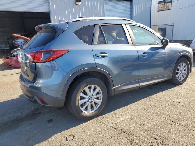 Photo 3 from auction – 2015 MAZDA CX-5 TOURI with VIN JM3KE2CY3F0489162