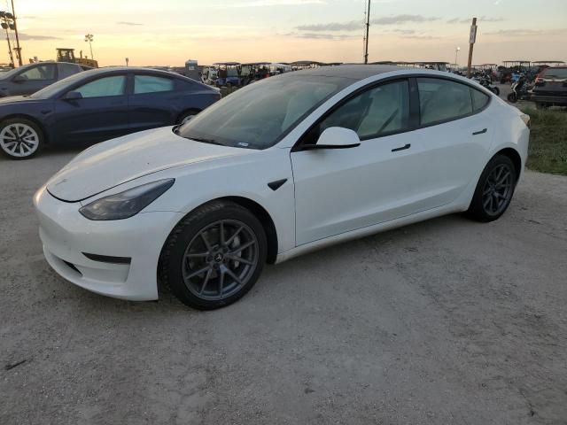 TESLA MODEL 3 2023 with VIN 5YJ3E1EA6PF694680 - Photo from auction