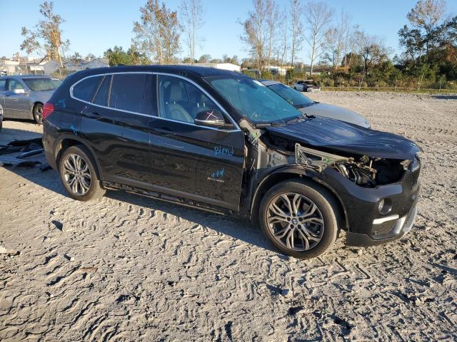Photo 4 from auction – 2017 BMW X1 XDRIVE2 with VIN WBXHT3C30H5F76726