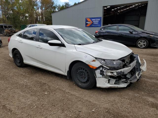 Photo 4 from auction – 2021 HONDA CIVIC LX with VIN 2HGFC2F54MH015216