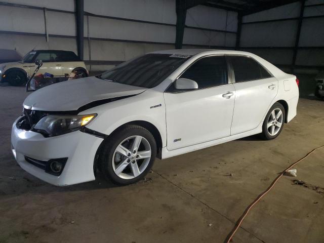 TOYOTA CAMRY HYBR 2014 with VIN 4T1BD1FK4EU117488 - Photo from auction