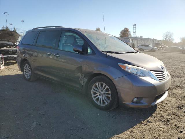 Photo 4 from auction – 2014 TOYOTA SIENNA XLE with VIN 5TDYK3DC8ES445125