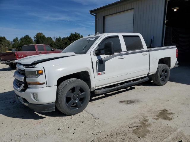 CHEVROLET SILVERADO 2017 with VIN 3GCUKREC5HG371861 - Photo from auction