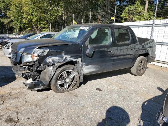 Снимка 1 от търг – 2014 HONDA RIDGELINE с VIN 5FPYK1F75EB012197
