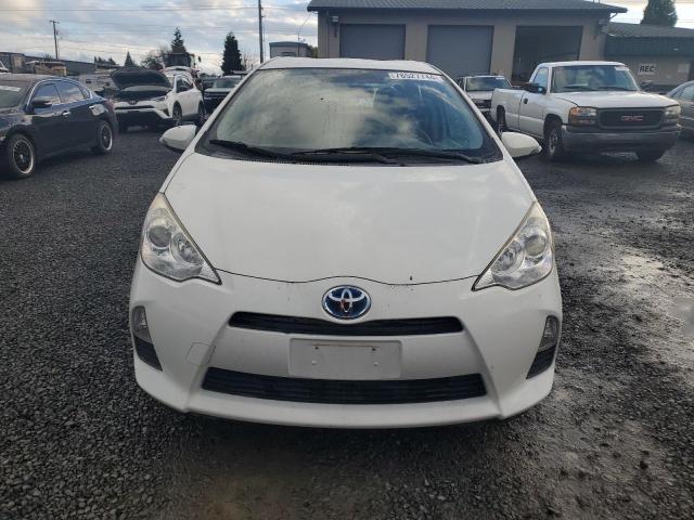 Photo 5 from auction – 2014 TOYOTA PRIUS C with VIN JTDKDTB33E1084662