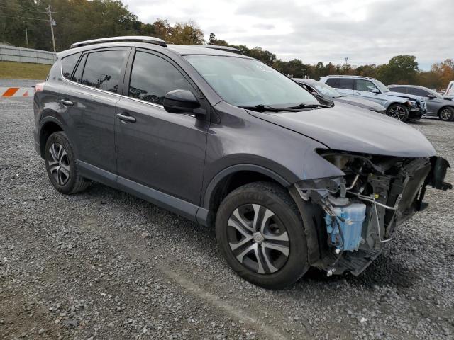 Photo 4 from auction – 2018 TOYOTA RAV4 LE with VIN JTMZFREV0JJ744501