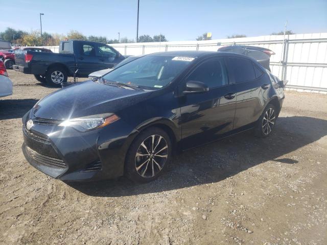 TOYOTA COROLLA L 2018 with VIN 2T1BURHE3JC053235 - Photo from auction