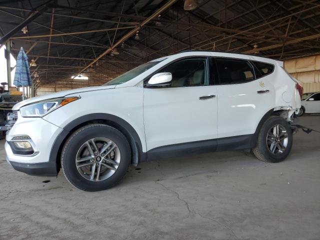 HYUNDAI SANTA FE S 2018 with VIN 5NMZU3LB4JH098476 - Photo from auction