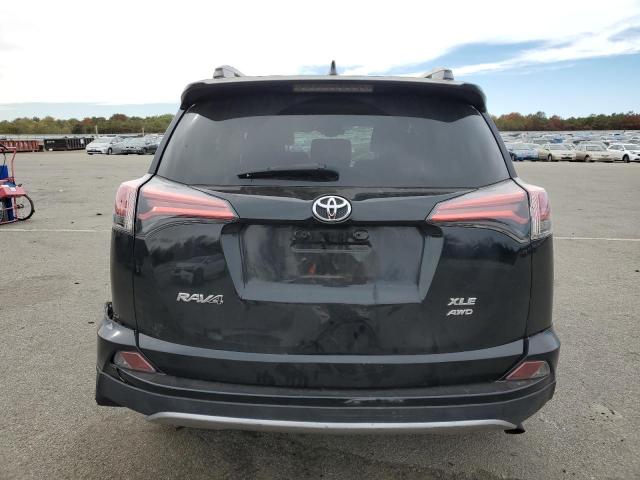 Photo 6 from auction – 2017 TOYOTA RAV4 XLE with VIN 2T3RFREV4HW661925