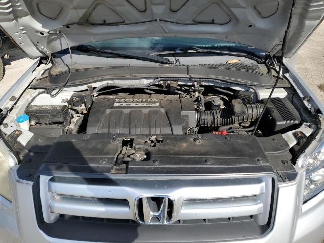 Photo 12 from auction – 2007 HONDA PILOT LX with VIN 2HKYF181X7H530347