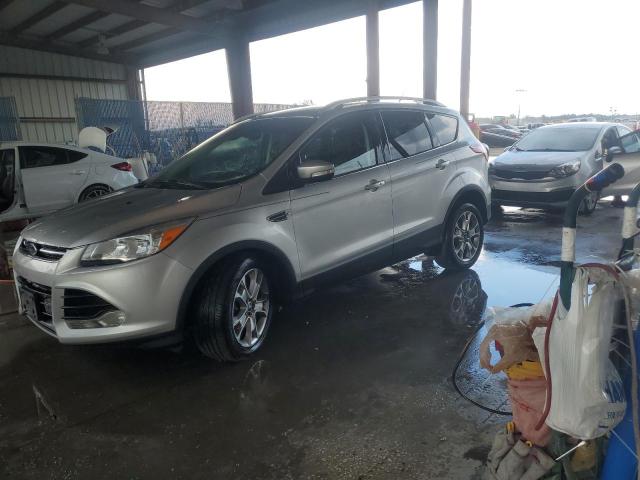 FORD ESCAPE TIT 2015 with VIN 1FMCU0J94FUA37306 - Photo from auction
