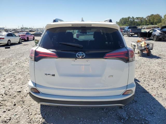 Photo 6 from auction – 2017 TOYOTA RAV4 SE with VIN JTMNFREV0HJ146482