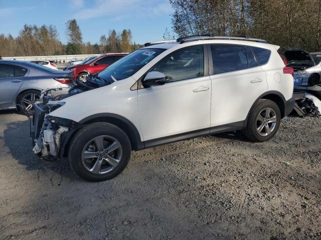 TOYOTA RAV4 XLE 2015 with VIN JTMRFREV6FD129702 - Photo from auction