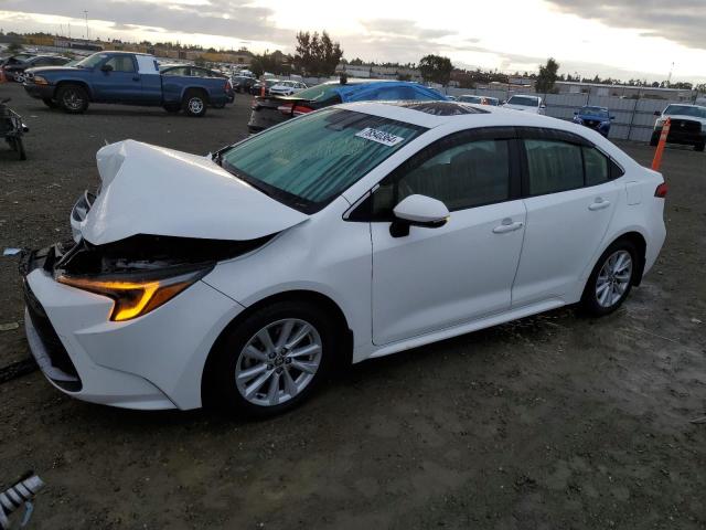 TOYOTA COROLLA LE 2023 with VIN JTDBCMFE9P3011307 - Photo from auction