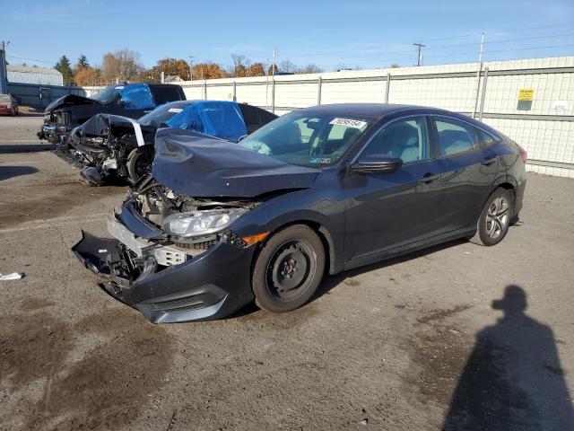 HONDA CIVIC LX 2017 with VIN 2HGFC2F54HH509128 - Photo from auction