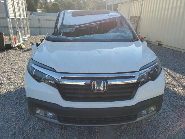 Photo 5 from auction – 2019 HONDA RIDGELINE with VIN 5FPYK3F73KB020029