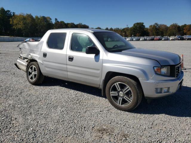 Photo 4 from auction – 2014 HONDA RIDGELINE with VIN 5FPYK1F71EB011953