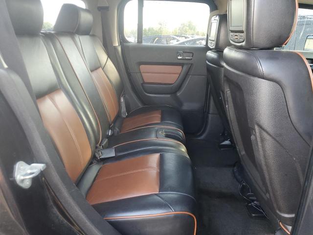 Photo 11 from auction – 2009 HUMMER H3 ALPHA with VIN 5GTEN13L898121336