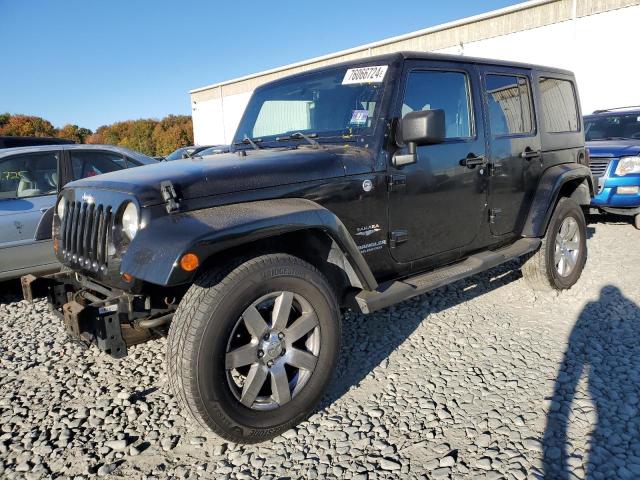 JEEP WRANGLER U 2011 with VIN 1J4BA3H13BL597113 - Photo from auction