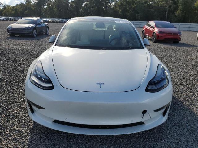 Photo 5 from auction – 2021 TESLA MODEL 3 with VIN 5YJ3E1EA4MF853756