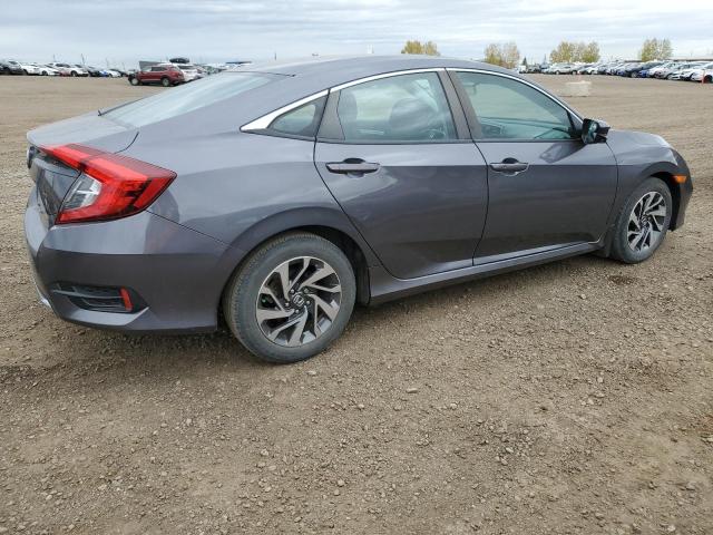Photo 3 from auction – 2019 HONDA CIVIC EX with VIN 2HGFC2F76KH020691