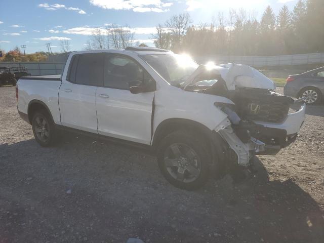 Photo 4 from auction – 2024 HONDA RIDGELINE with VIN 5FPYK3F63RB008948
