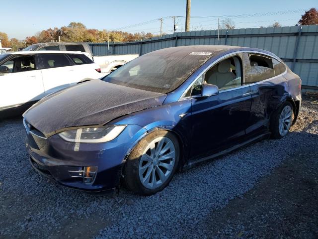 TESLA MODEL X 2017 with VIN 5YJXCBE21HF065612 - Photo from auction
