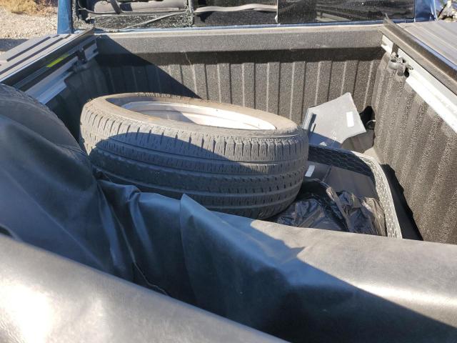 Photo 12 from auction – 2023 RAM 1500 LARAM with VIN 1C6SRFJT4PN510625