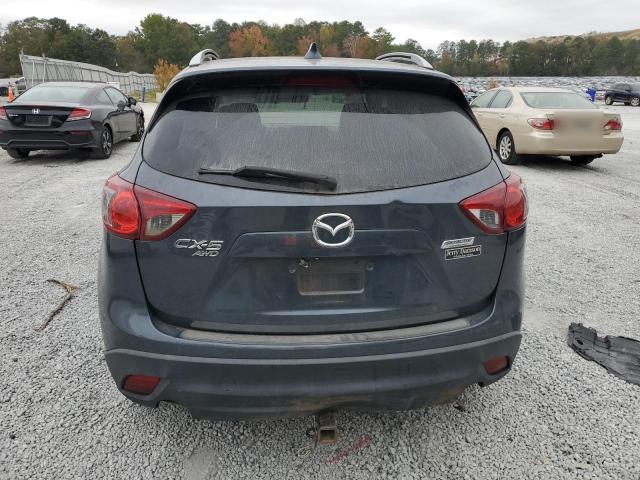 Photo 6 from auction – 2013 MAZDA CX-5 TOURI with VIN JM3KE4CE9D0160979