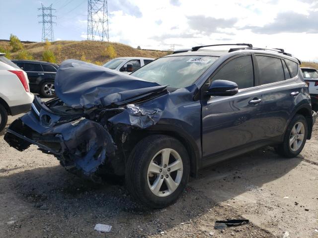 TOYOTA RAV4 XLE 2014 with VIN JTMRFREV9ED049809 - Photo from auction
