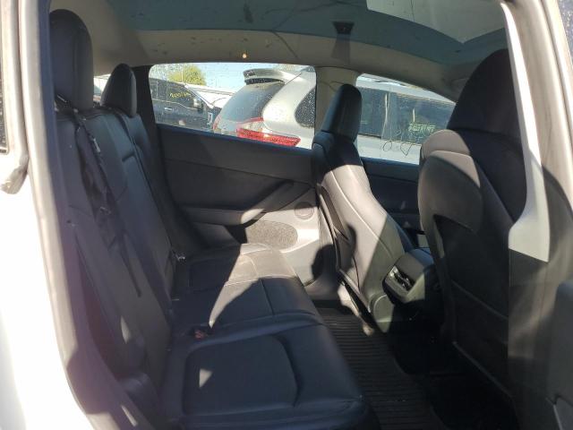 Photo 10 from auction – 2023 TESLA MODEL Y with VIN 7SAYGAEE0PF772926