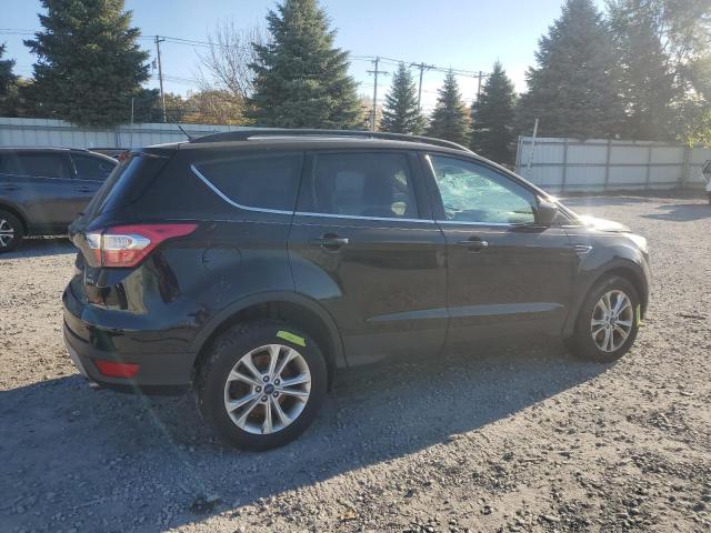 Photo 3 from auction – 2017 FORD ESCAPE SE with VIN 1FMCU9G92HUD87516