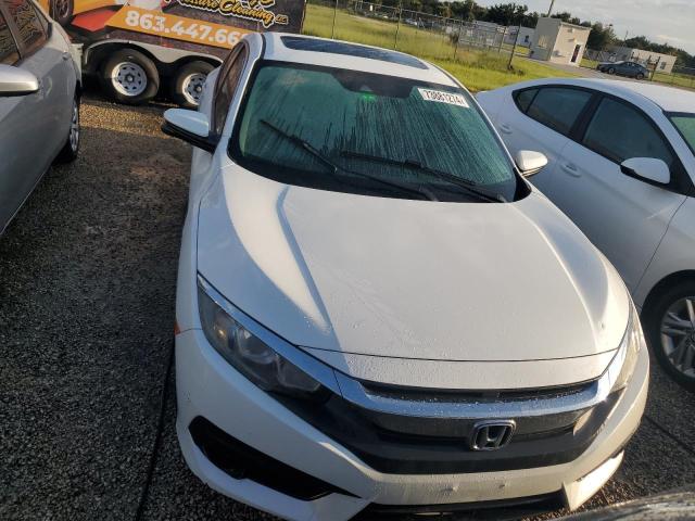 Photo 5 from auction – 2016 HONDA CIVIC EX with VIN 19XFC2F84GE056132