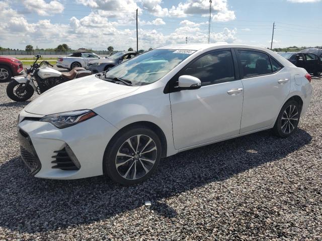 TOYOTA COROLLA L 2018 with VIN 5YFBURHE9JP840982 - Photo from auction