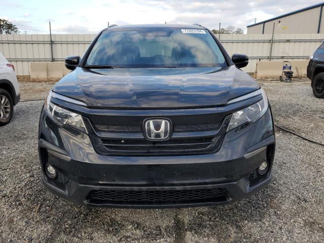 Photo 5 from auction – 2021 HONDA PILOT SE with VIN 5FNYF5H23MB045624