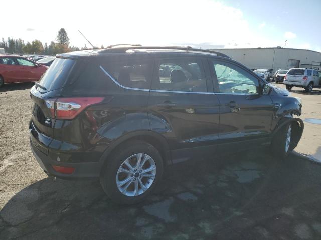 Photo 3 from auction – 2017 FORD ESCAPE SE with VIN 1FMCU9GD9HUD95472
