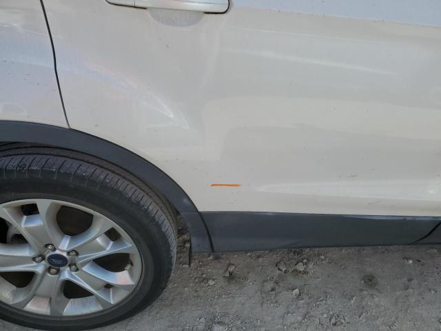 Photo 12 from auction – 2016 FORD ESCAPE TIT with VIN 1FMCU0J93GUC73947