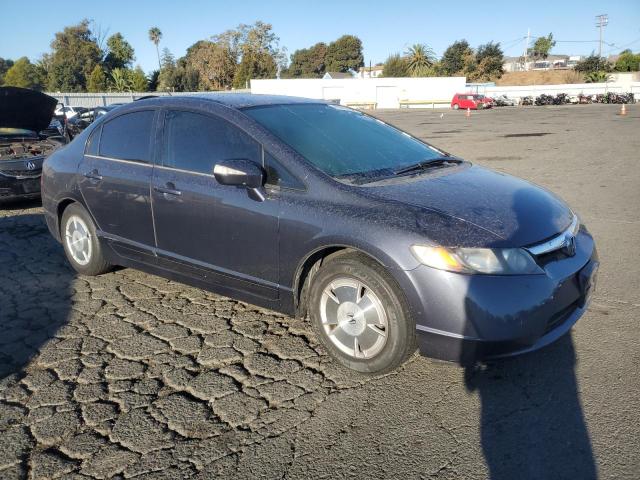 Photo 4 from auction – 2006 HONDA CIVIC HYBR with VIN JHMFA36216S030766