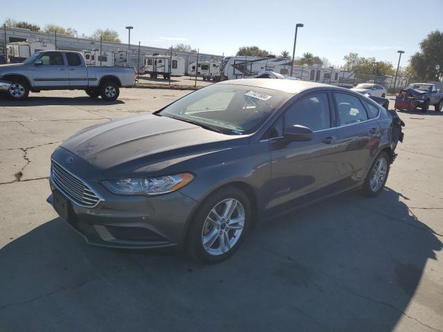 FORD FUSION SE 2018 with VIN 3FA6P0LU3JR204352 - Photo from auction