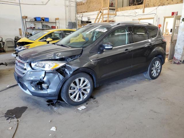 FORD ESCAPE TIT 2017 with VIN 1FMCU0JD6HUB23692 - Photo from auction