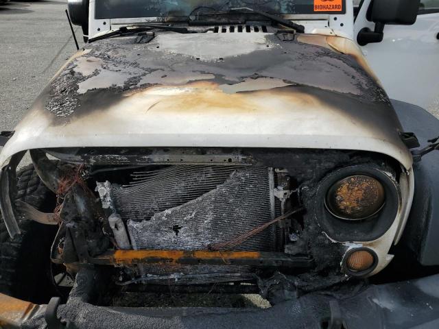 Photo 12 from auction – 2013 JEEP WRANGLER U with VIN 1C4BJWDG7DL580027