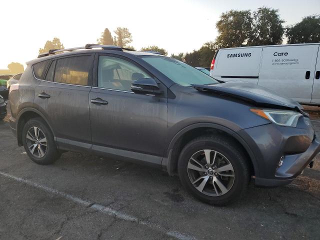 Photo 4 from auction – 2017 TOYOTA RAV4 XLE with VIN JTMWFREV8HJ704101