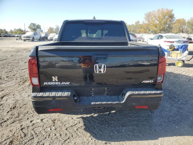 Photo 6 from auction – 2017 HONDA RIDGELINE with VIN 5FPYK3F84HB003869
