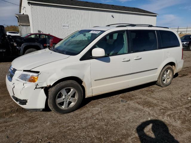 DODGE GRAND CARA 2010 with VIN 2D4RN5D17AR102060 - Photo from auction